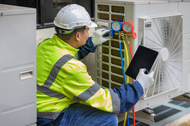 Professional Air Duct Cleaning technician working in Potomac, MD